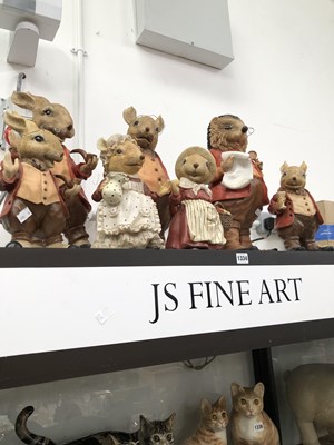 Lot 1334 - Seven composition animals standing in human...