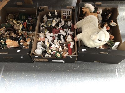 Lot 1349 - A collection of composition dogs and other...