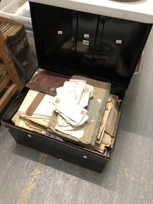 Lot 1385 - A tin trunk containing newspapers, some books,...