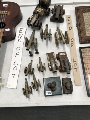 Lot 1387 - A collection of miniature toy cannons