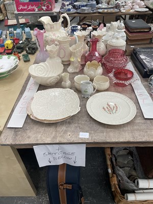Lot 1426 - Belleek porcelains, a suitcase and some...