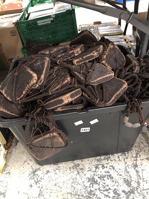 Lot 1451 - A fishing net with cork floats