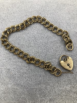Lot 252 - A 9ct hallmarked gold charm bracelet. Weight...