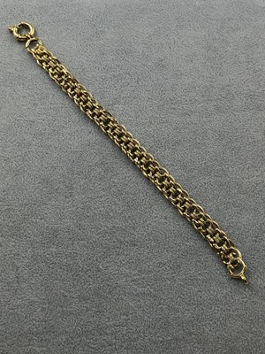 Lot 260 - A 9ct hallmarked gold fancy link bracelet....