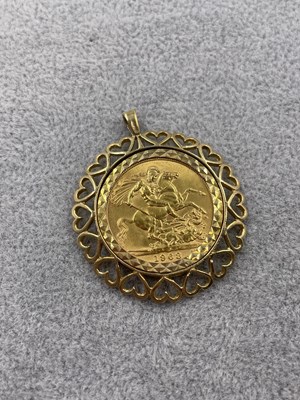 Lot 263 - A 1963 full sovereign 22ct gold coin held in a...