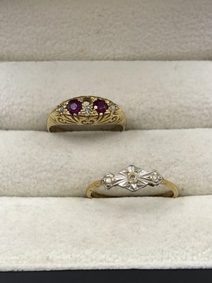 Lot 264 - Two 18ct hallmarked gold diamond and gemset...