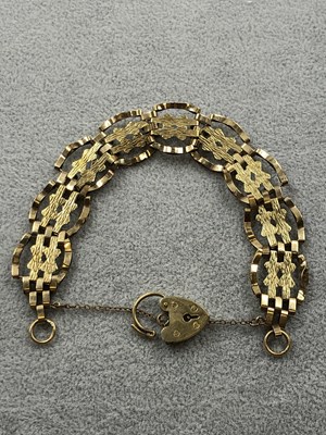 Lot 268 - A 9ct hallmarked gold fancy link gate bracelet...