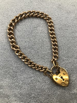 Lot 314 - A 9ct hallmarked gold charm bracelet, each...
