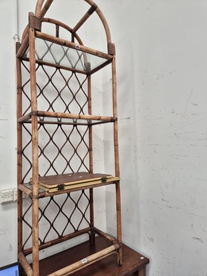 Lot 505 - A bamboo four tier stand.