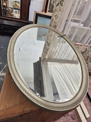Lot 514 - A large edwardian oval wall mirror.