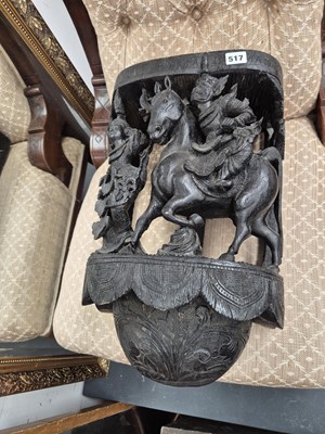Lot 517 - An eastern carved hardwood wall bracket.