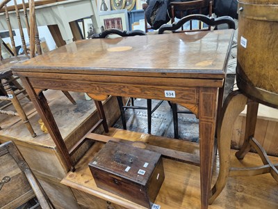 Lot 534 - An Edwardian rosewood and inlaid foldover...