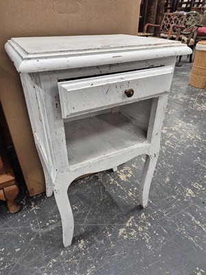 Lot 540 - A painted bedside table.