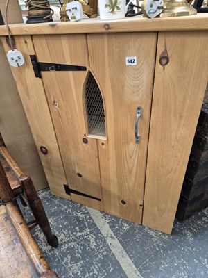 Lot 542 - A pine corner cabinet.