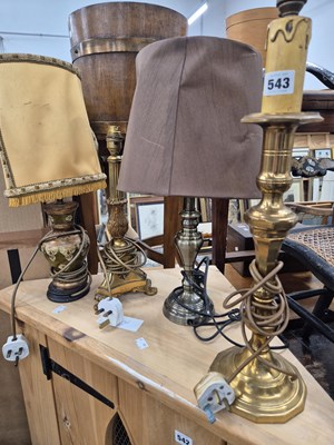 Lot 543 - Four various table lamps.
