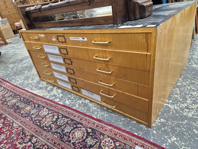 Lot 552 - A six drawer low plan chest. W 123 D 84 H 52.2 cm