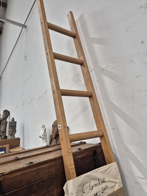Lot 555 - A modern wooden loft or library ladder.