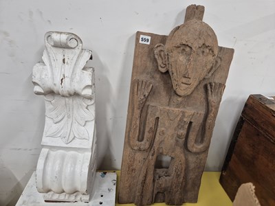 Lot 559 - A small indonesian door panel cared with a...