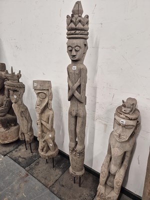 Lot 562 - An indonesian carved standing figure with...