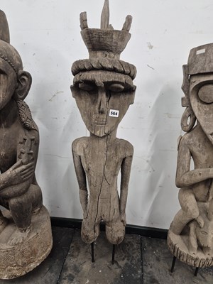 Lot 564 - An indonesian carved  standing figure with...