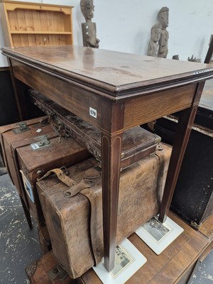 Lot 579 - A Gergian mahogany foldover tea table.