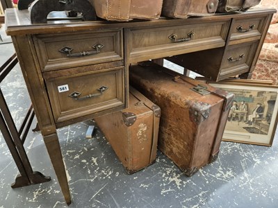 Lot 581 - A sewing machine table.