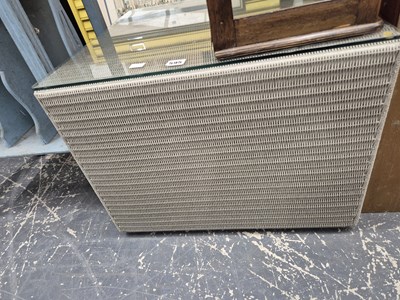 Lot 595 - A loom conservatory coffee table.