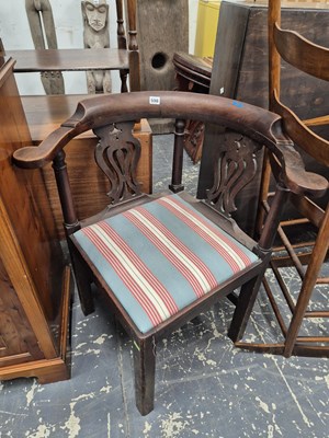 Lot 598 - A Georgian mahogany corner armchair.