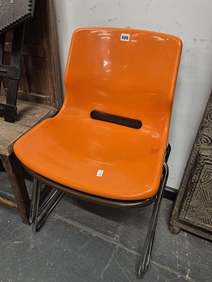 Lot 609 - A Pair of retro chrome and plastic stacking...