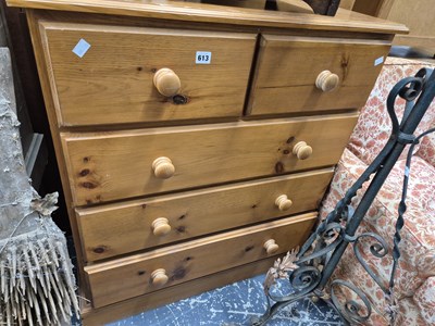 Lot 613 - A modern pine chest of drawers.