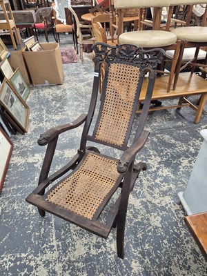 Lot 624 - An antique carved hardwood campaign type...