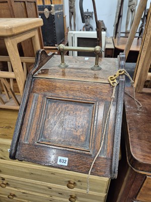 Lot 632 - An oak coal box.