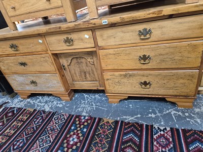 Lot 638 - A large 19th century pine dresser.
