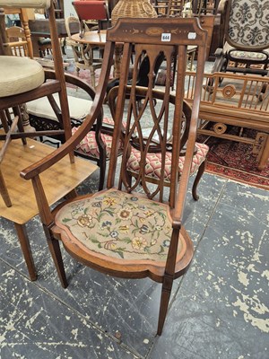 Lot 644 - An Edwardian mahogany inlaid high back armchair.