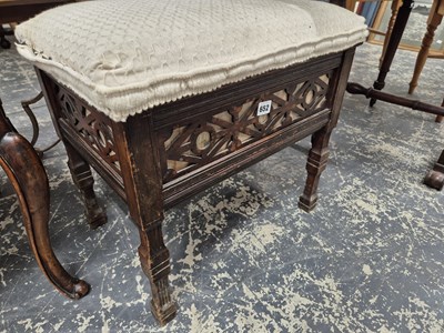 Lot 652 - A piano stool.