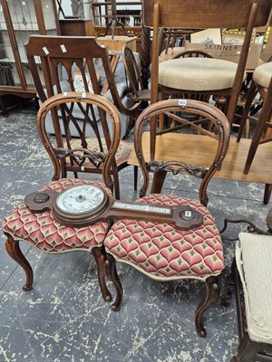 Lot 653 - A pair of Victorian balloon back chairs.