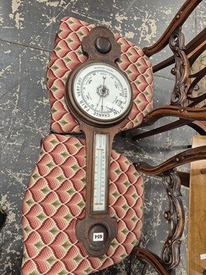 Lot 654 - An Aneroid barometer.