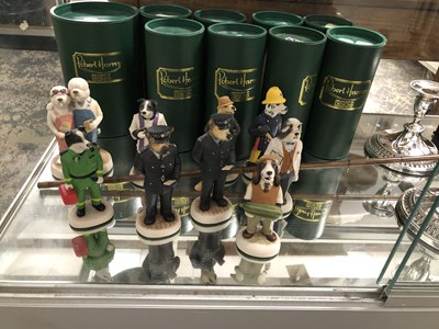 Lot 1534 - Nine Country Companion dog figures, an ebony...
