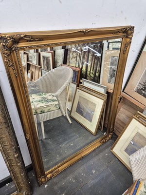 Lot 664 - A gilt framed wall mirror.