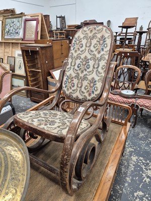 Lot 672 - A bentwood rocking chair.