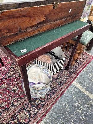 Lot 680 - A folding bridge table.