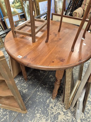 Lot 683 - A small pine table.