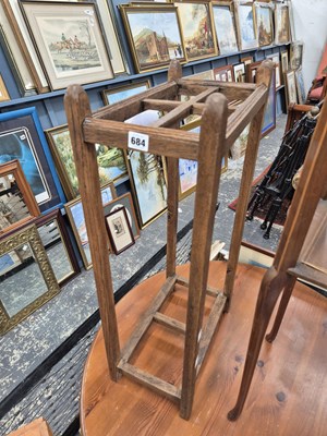 Lot 684 - An oak stick stand.