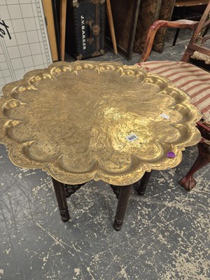 Lot 685 - An antique brass top benares table with...