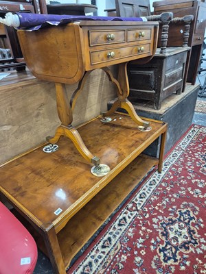 Lot 695 - A yew wood large coffee table and a similar...