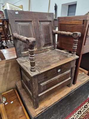 Lot 696 - An early 18th century and later oak box seat...