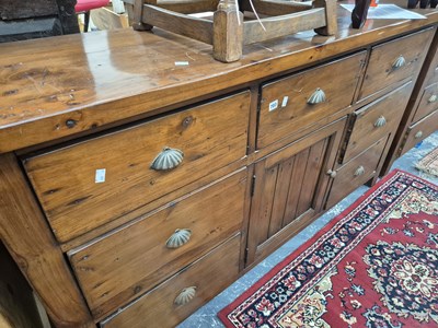 Lot 703 - A large pine dresser base.