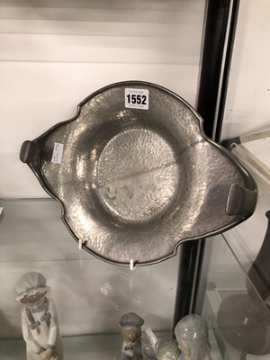 Lot 1552 - A Tudric hammered pewter two handled shallow bowl