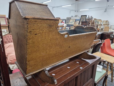 Lot 705 - An antique pine rocking cradle.