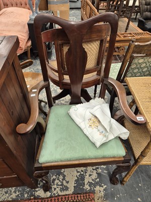 Lot 707 - A mahogany armchair.